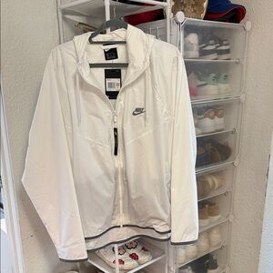 ****TODAY ONLY***. $35.  BNWT. Nike Women's White rain jacket